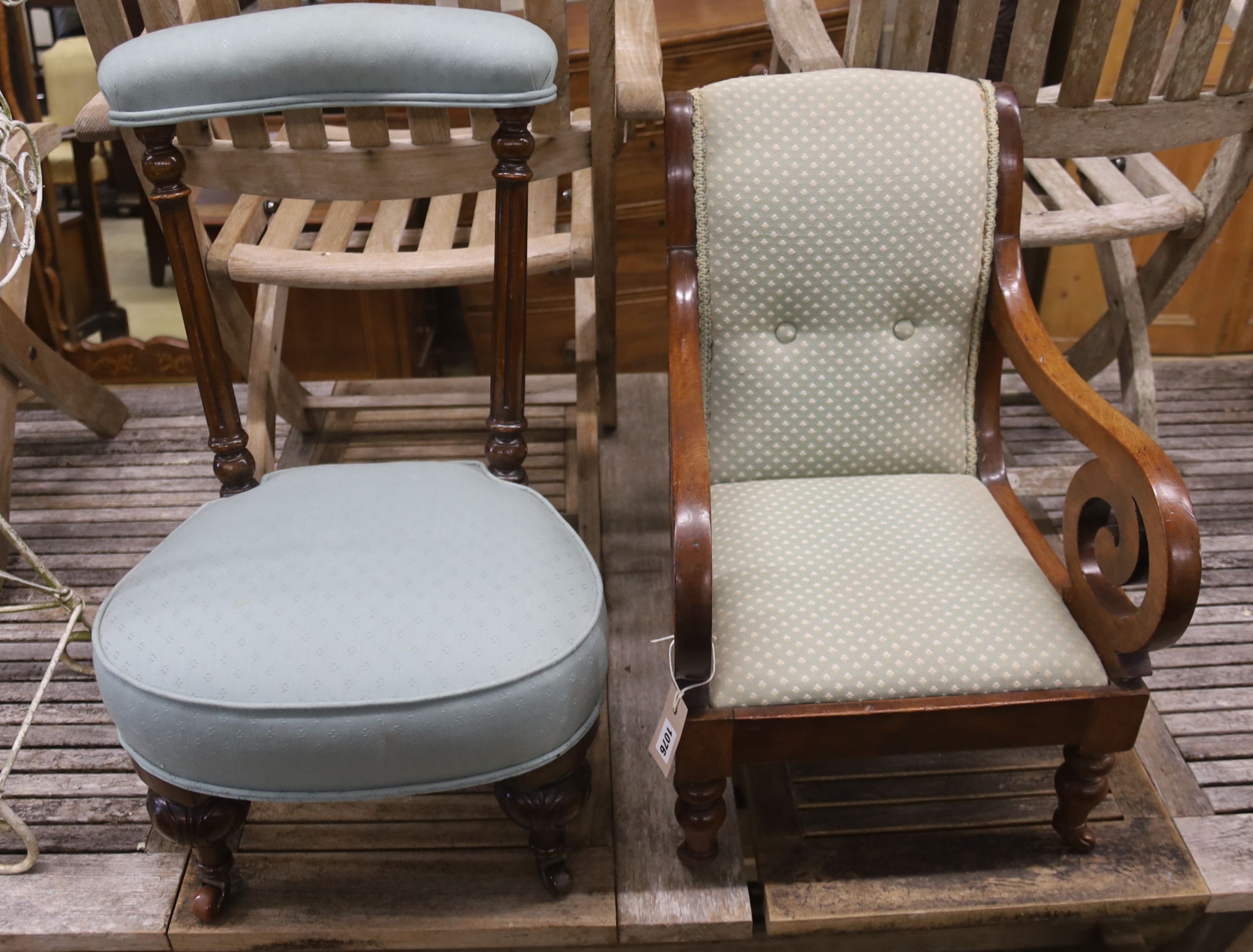 A Victorian mahogany child's elbow chair, width 38cm, depth 46cm, height 60cm, together with one other Victorian child's chair